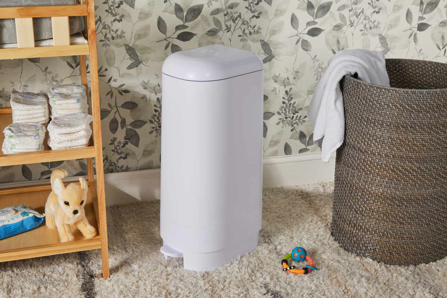 The Diaper Genie Signature Diaper Pail in a nursery