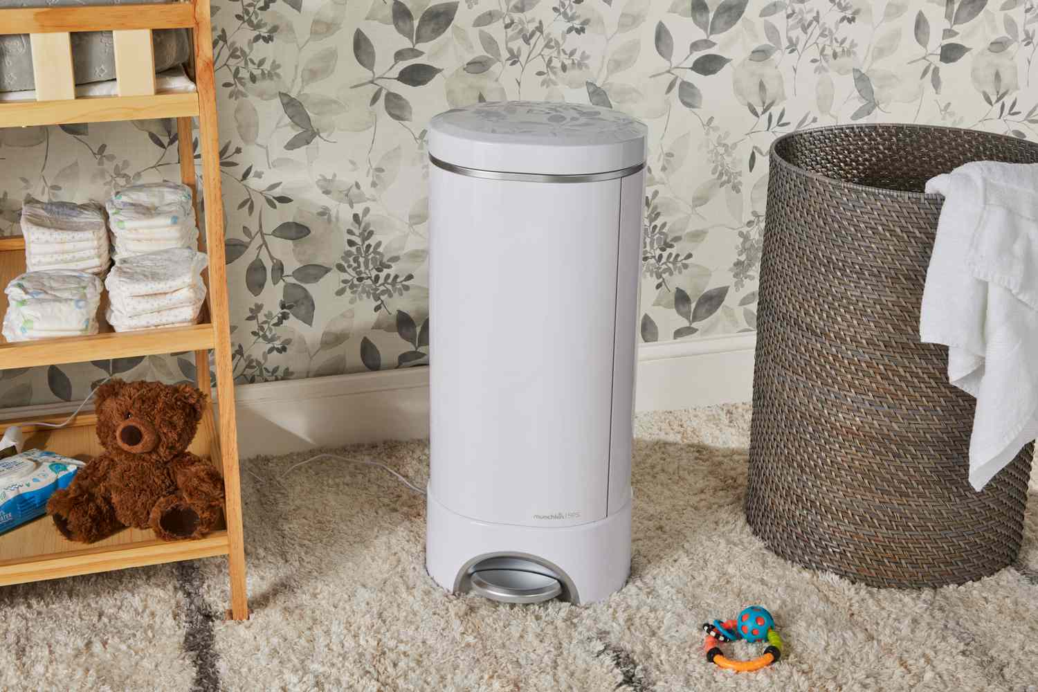 The Munchkin UV Diaper Pail in a nursery