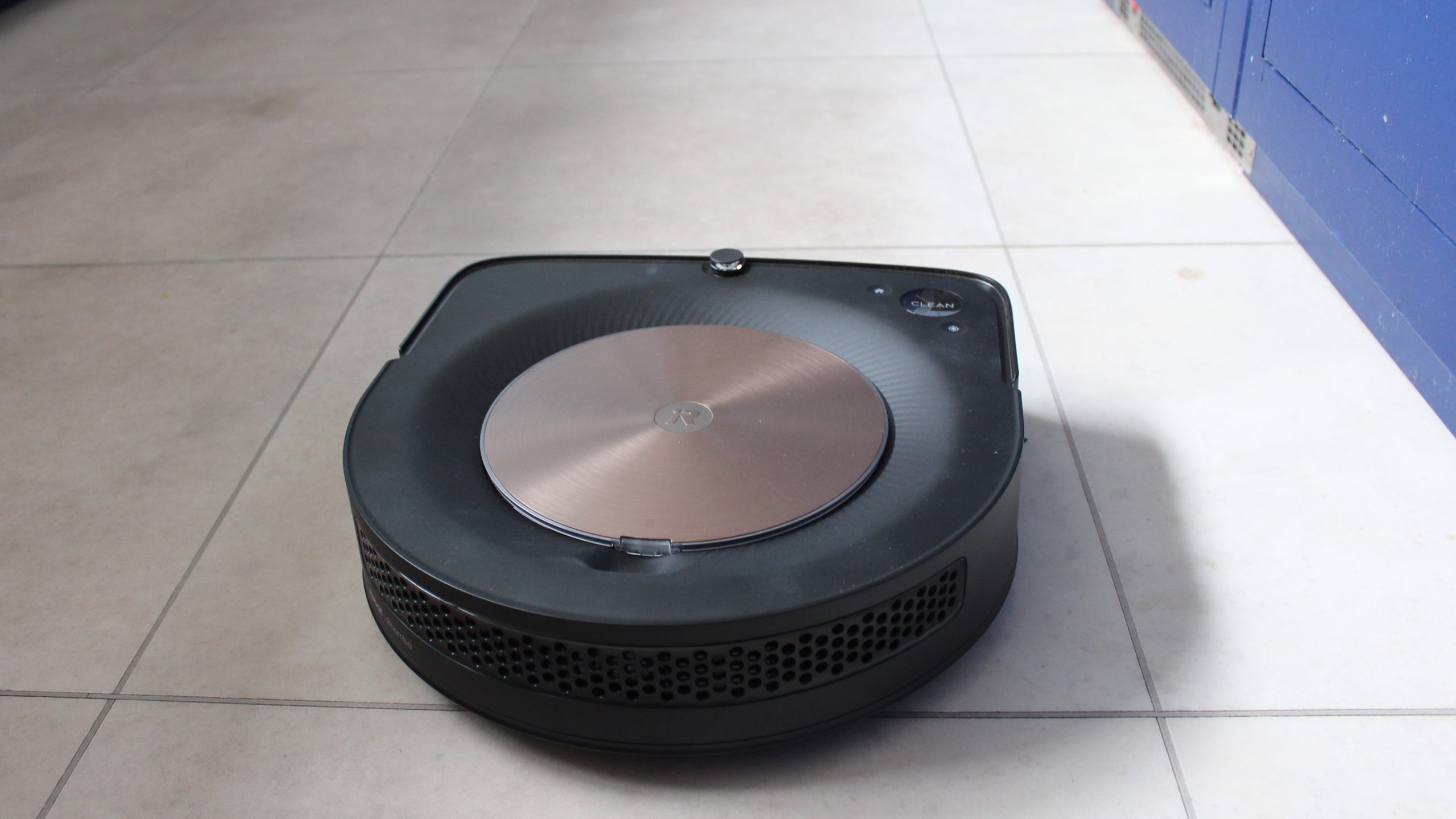 iRobot Roomba S9  on a tiled floor